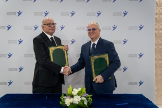 Amin Benjelloun Touimi, DG du groupe Barid Al-Maghrib, et Omar Seghrouchni, président de la CNDP.